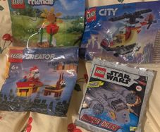 4 small Lego bags: friends, Star Wars, city