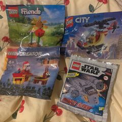 4 small Lego bags: friends, Star Wars, city