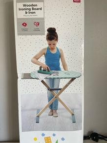 wooden ironing board and iron