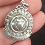 A silver medal or pendant depicting the Irish harp Image 5