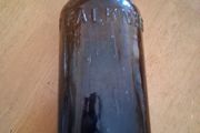 Antique Francis Faulkner Dublin black glass whiskey bottle