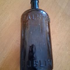 Antique Francis Faulkner Dublin black glass whiskey bottle