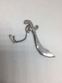 Vintage sterling silver brooch with safety chain