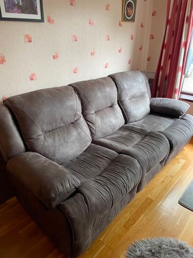 Three seater reclining sofa