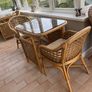 Cane dining table and chairs Image 4