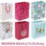 Christmas Jingle Gift Bags - 16 Christmas Gift Bags In Total - 4 x Large Gift Bags (29 x 33 cm) - 6 x Wine Bottle Bags (13 x 36 cm) - 6 x Medium Gift Bags (17 x 22 cm) - Xmas Gift Bags (FREE POSTAGE) Image 5
