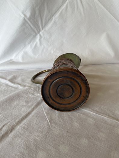 Copper and brass ornamental jug