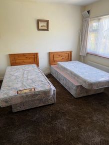 2 Single Beds with Mattresses and Pine Headboards