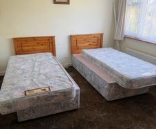 2 Single Beds with Mattresses and Pine Headboards