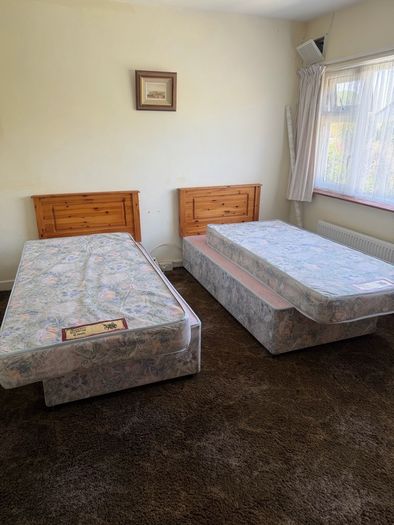 2 Single Beds with Mattresses and Pine Headboards