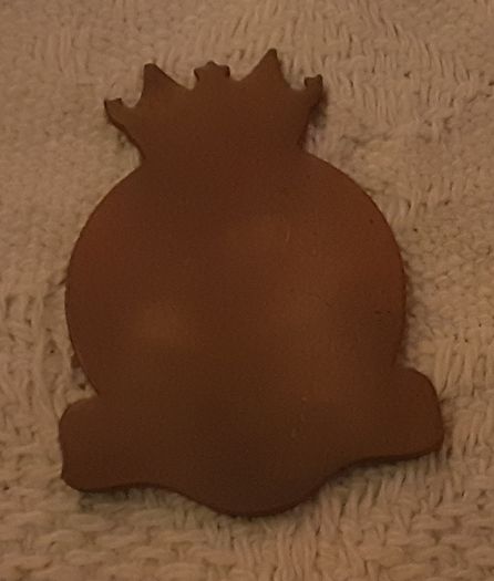 A T C badge