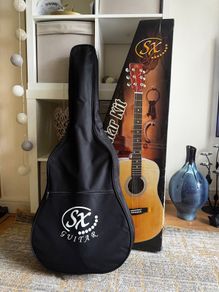 SX acoustic guitar and accessories