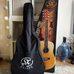 SX acoustic guitar and accessories