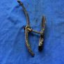 Cast iron band for end over end butter churn lid plus another misc butter churn item Image 6