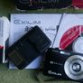 Casio Exilim EX-Z1050 Digital camera Made w/ Box and Accessories , universal charger- Tested Image 2