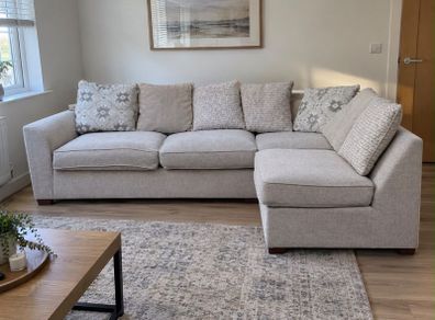 Beige L shaped corner sofa