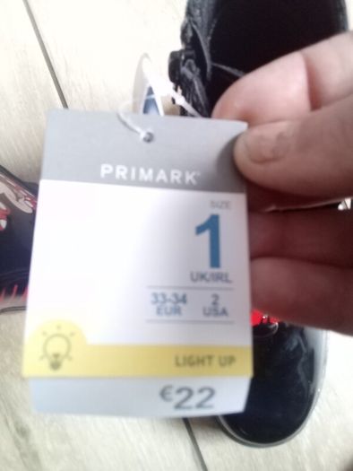 girls Disney boots size by 1....light up soles