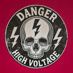 Danger high voltage , vintage style metal sign .