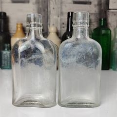 338 - Set of 2 Vintage Clear Glass Collectible Decorative Whiskey Flask Bottles