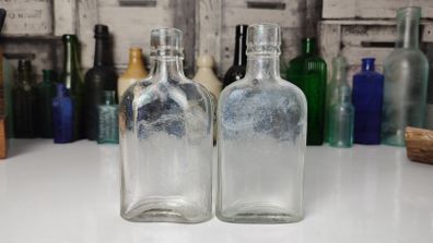 338 - Set of 2 Vintage Clear Glass Collectible Decorative Whiskey Flask Bottles
