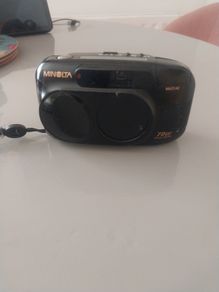 minolita camera. multi af,70 w zoom