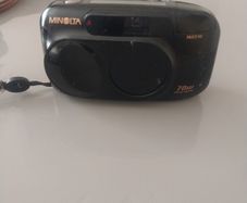 minolita camera. multi af,70 w zoom