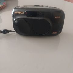 minolita camera. multi af,70 w zoom