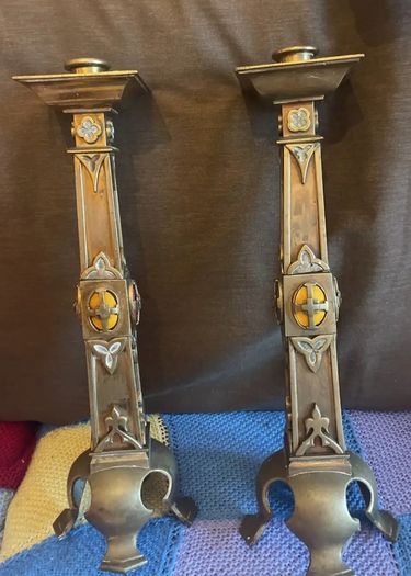 Antique French renaissance brass mantel clock with knight figure  pair of renaissance brass candlesticks with enamel inlays.