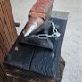 anvil on timber stand Image 3
