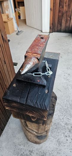 anvil on timber stand