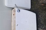 Used ceramic toilet cistern tank