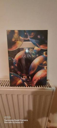 Guinness old vintage show card ,with old advertising,,good condition see pictures for condition,buyer collects or pays postage thank you,,take as is,  hard to come by,collectors item,only going up in value,