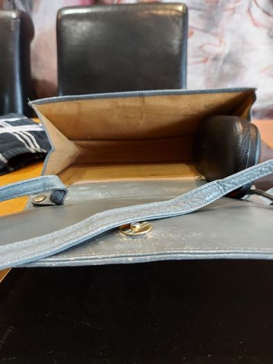 Grey Faux Leather  clutch bag .