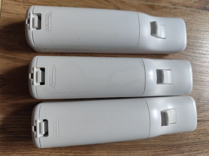 A set of 3 Nintendo Wii controllers
