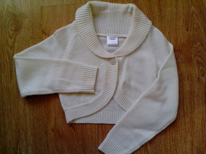 Light cream cardigan.  Age 7-8