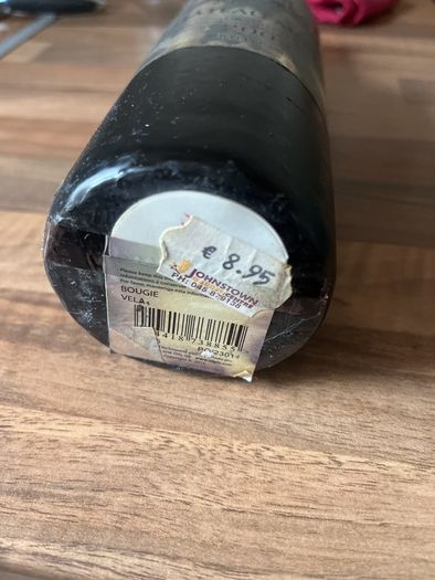 Candle shaped like a bottle of wine