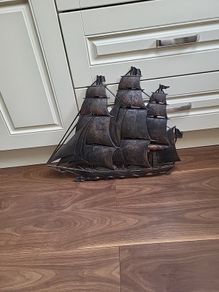Skipper ship wall hanging