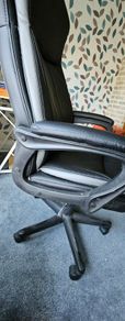 High back leather executive office/ Desk Chair- adjustable height and padded arms.