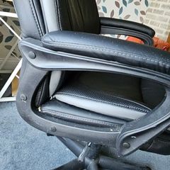 High back leather executive office/ Desk Chair- adjustable height and padded arms.