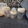 Breast pump baby bottles and baby clothes Image 4