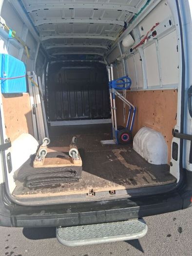 man with a medium size van