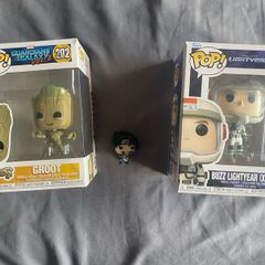 funko pops: groot, buzz light year, and sasuke