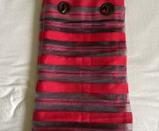 Red and black curtain panel