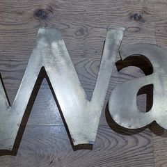 WATERFORD brass letters