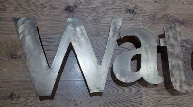 WATERFORD brass letters