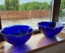 Pair of Kosta Boda Swedish blue glass bowls