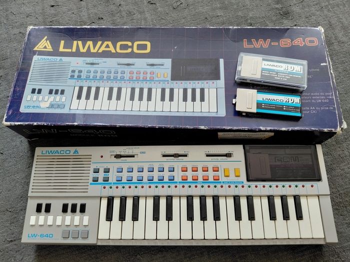 vintage Liwaco keyboard in box with 3 music roms