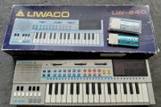 vintage Liwaco keyboard in box with 3 music roms