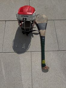 Hurling helmet and stick