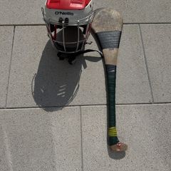 Hurling helmet and stick